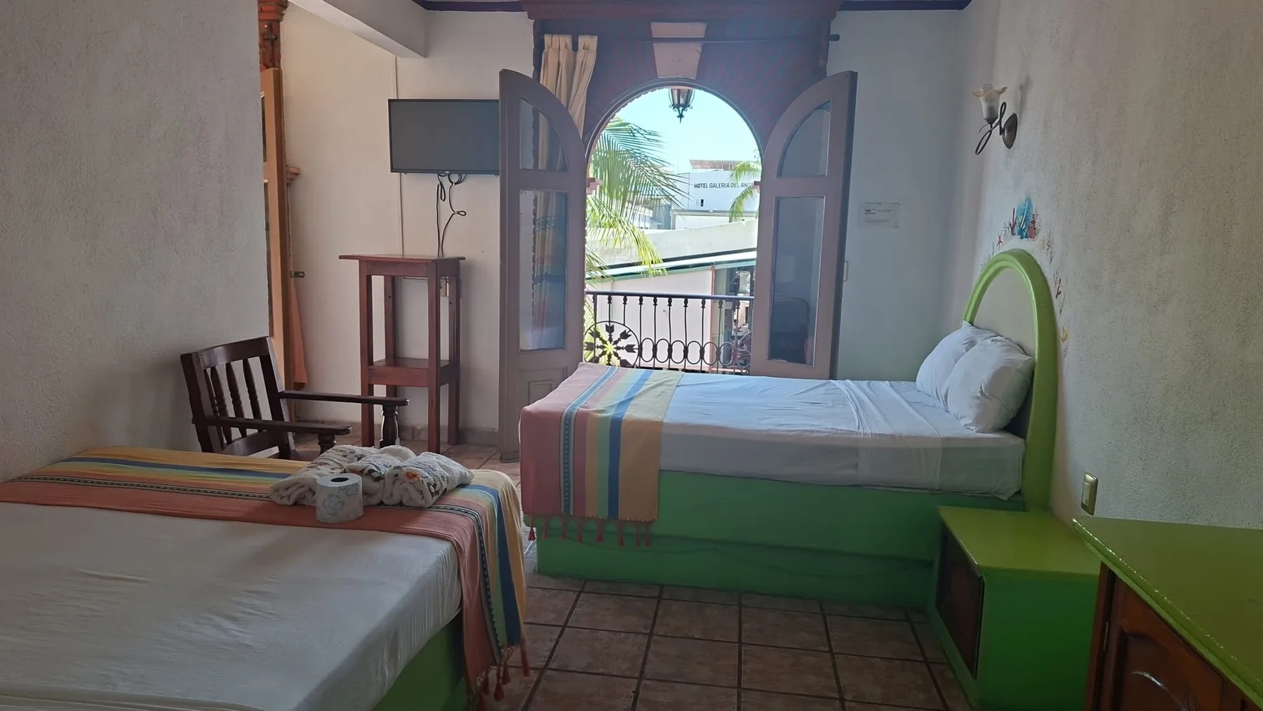 Habitación con dos camas del Hotel Real Aligheri